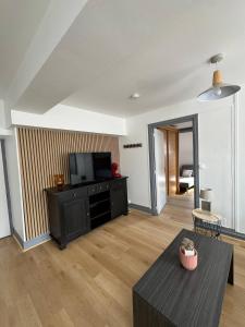 Kuchyň nebo kuchyňský kout v ubytování Le Piton - Appartements