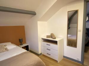 Postel nebo postele na pokoji v ubytování Le Piton - Appartements