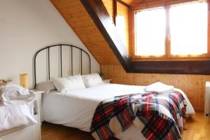 Postel nebo postele na pokoji v ubytování Misalas, Ski y montaña petfriendly - Arafita Apartamentos