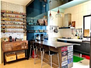 Una cocina o kitchenette en 漫調子 Roaming Life B&B