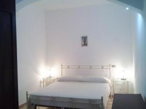 A bed or beds in a room at Villa Aquarium