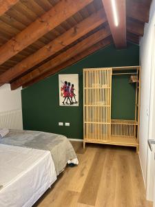Postel nebo postele na pokoji v ubytování Green Suite