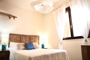 Una cama o camas en una habitación de Casa Ebinger