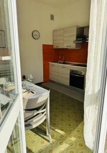 Kuchyňa alebo kuchynka v ubytovaní Appartamenti Giulia - Palazzo Milano