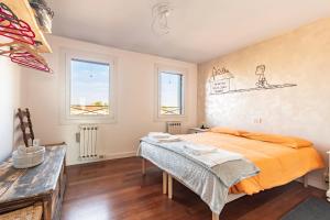 Katil atau katil-katil dalam bilik di Affaccio sul Brenta - bright apartment in Oriago