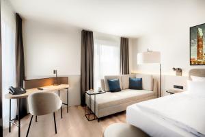 Postel nebo postele na pokoji v ubytování Welcome Hotel Darmstadt City Center + 34 fotografií