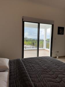 Postel nebo postele na pokoji v ubytování Villa Paradiso