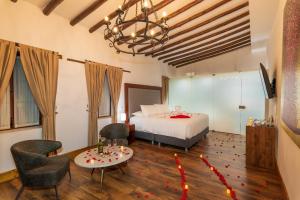 Postel nebo postele na pokoji v ubytování Hotel Boutique MR