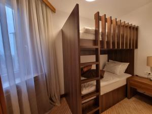 Ένα ή περισσότερα κρεβάτια σε δωμάτιο στο Apartman Queen privatni app Vučko