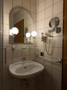 Koupelna v ubytování Pension Erlaa + 23 fotografií