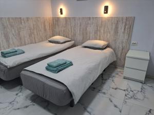 Voodi või voodid majutusasutuse Casa Tartago toas