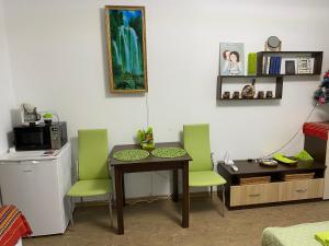 Η κουζίνα ή μικρή κουζίνα στο Green Studio Hotel Sol e Mar