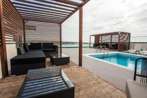Bazén v ubytování Hotel Pérola nebo v jeho okolí
