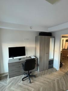 TV a/nebo společenská místnost v ubytování Durbuy House gîte noyer