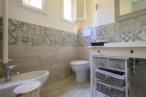 Koupelna v ubytování Oasis in the centre of Bologna + 48 fotografií