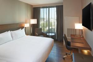 Postel nebo postele na pokoji v ubytování AC Hotel by Marriott Seattle Bellevue/Downtown + 37 fotografií