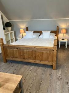Katil atau katil-katil dalam bilik di Ferienwohnung Dralle +70 gambar