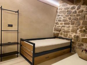 Кровать или кровати в номере Loft con encanto Casa Paquita