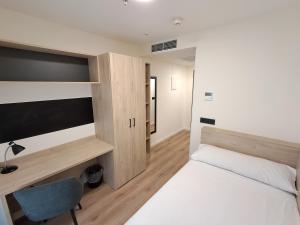 Posteľ alebo postele v izbe v ubytovaní Micampus Alicante Student Residence