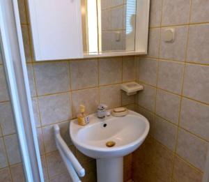 Koupelna v ubytování Apartments Keko