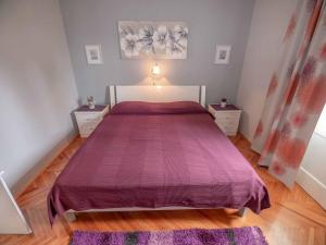 Postel nebo postele na pokoji v ubytování Apartments Keko