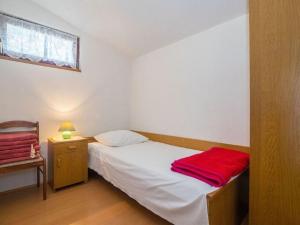 Postel nebo postele na pokoji v ubytování Apartments Dane