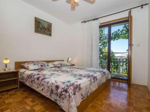 Postel nebo postele na pokoji v ubytování Apartments Dane
