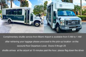 a food truck parked on a street with a flyer at Clarion Inn & Suites Miami International Airport in Miami