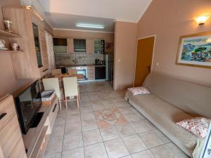 Kuchyň nebo kuchyňský kout v ubytování Apartments Keko