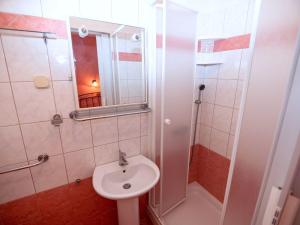 Koupelna v ubytování Apartments Keko