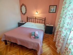 Postel nebo postele na pokoji v ubytování Apartments Keko