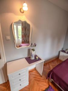 Postel nebo postele na pokoji v ubytování Apartments Keko