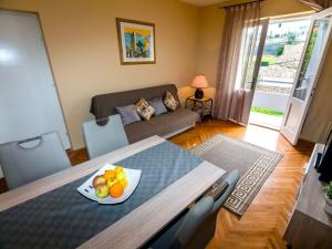 Postel nebo postele na pokoji v ubytování Apartments Keko