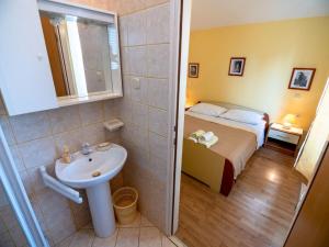 Koupelna v ubytování Apartments Keko