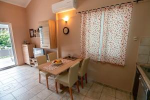 Kuchyň nebo kuchyňský kout v ubytování Apartments Keko