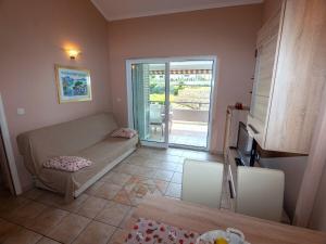 Postel nebo postele na pokoji v ubytování Apartments Keko