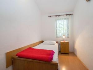 Postel nebo postele na pokoji v ubytování Apartments Dane