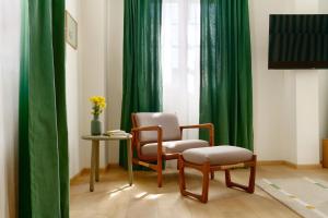 TV a/nebo společenská místnost v ubytování Hotel Parián