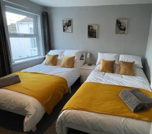 Katil atau katil-katil dalam bilik di Admiral Blake Guesthouse
