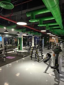 Phòng/tiện nghi tập thể dục tại شقة راقية بدخول ذاتي بالقرب البوليفارد