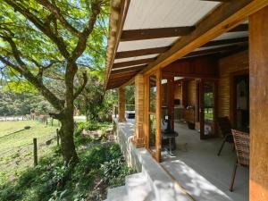 En have udenfor Casa Praia Do Rosa + 13 billeder