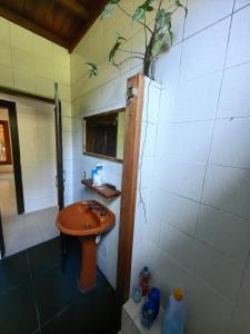 Et badeværelse på Casa Praia Do Rosa
