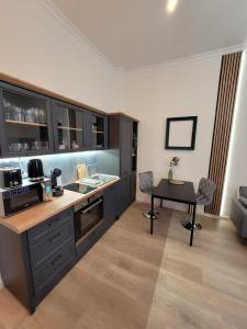Kuchyňa alebo kuchynka v ubytovaní Deco Studio City Residence