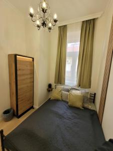 Posteľ alebo postele v izbe v ubytovaní Deco Studio City Residence
