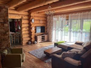 A seating area at Ranč pod Sninským kameňom