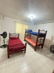 Postel nebo postele na pokoji v ubytování Apartamento tranquilo rodadero