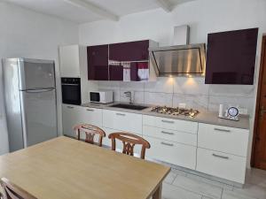 Η κουζίνα ή μικρή κουζίνα στο Villa Sole