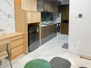 Kuchyň nebo kuchyňský kout v ubytování Stylish 1BR Smith Apt with Pool & Gym by 2ndHome