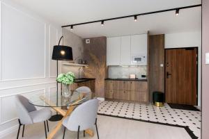 Η κουζίνα ή μικρή κουζίνα στο Devalia Rentyear Apartments