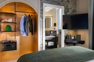 Postel nebo postele na pokoji v ubytování Hôtel L'Ormaie & Spa